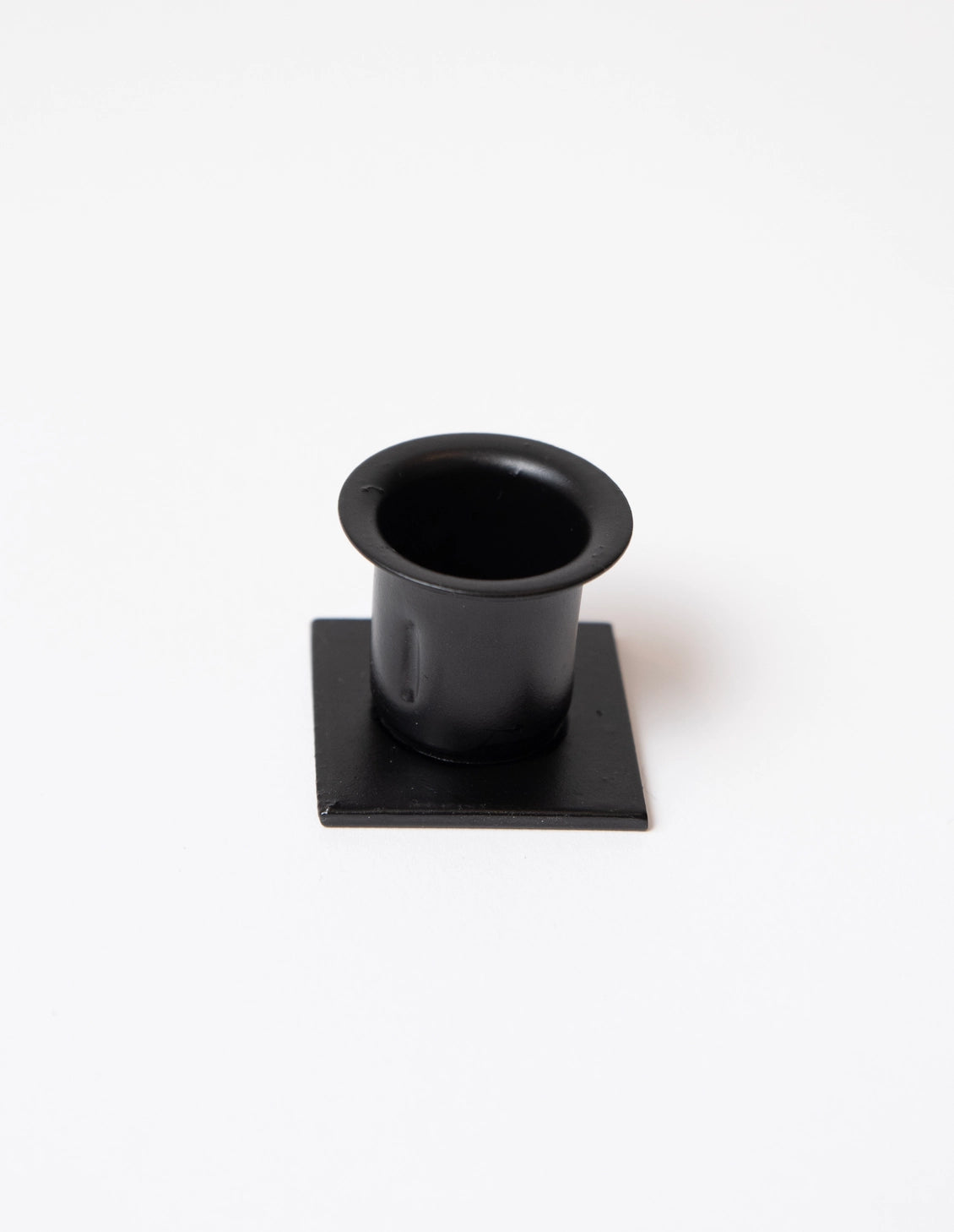 Invisible Taper Candle Holder